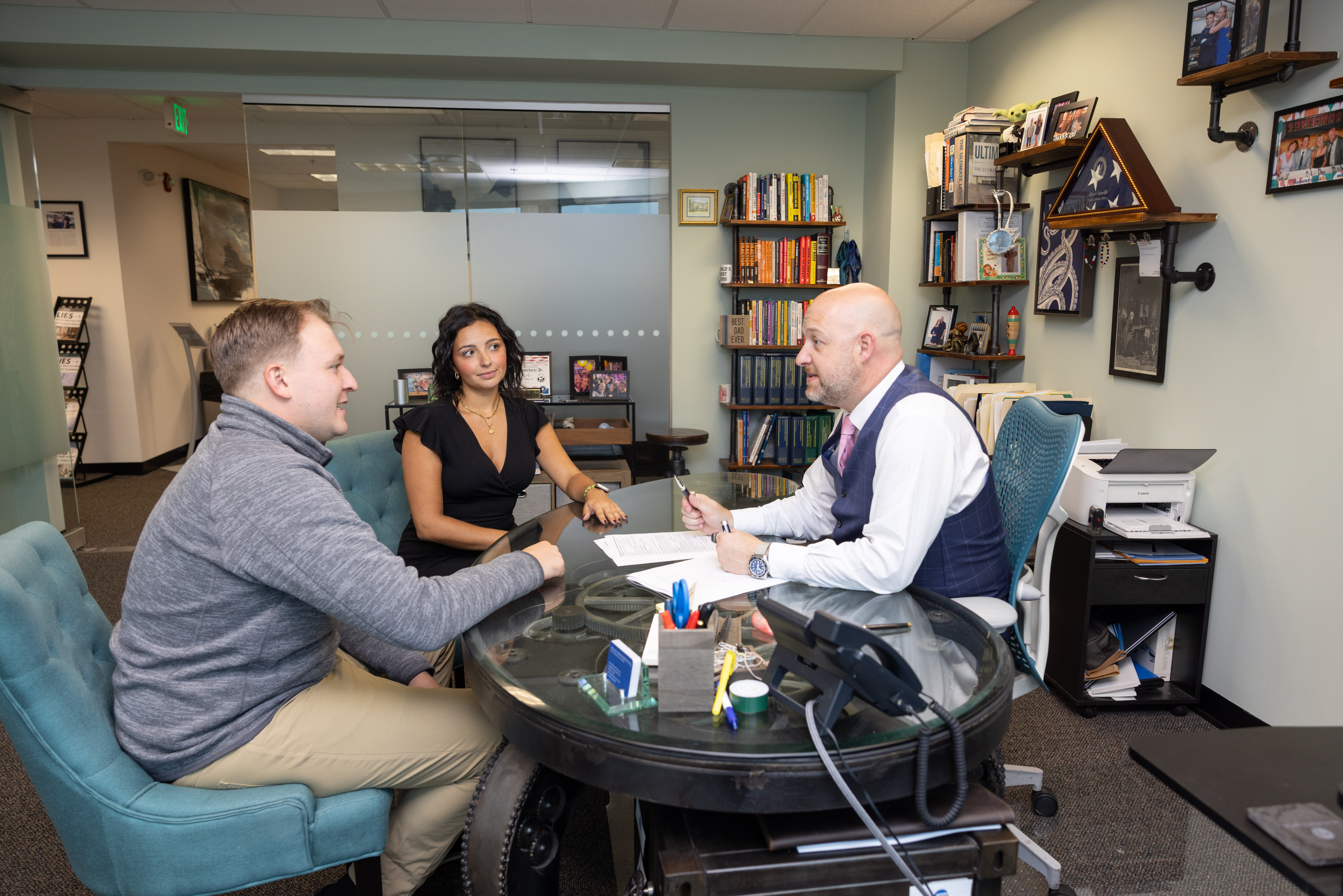 Attorney Michael Monteforte Jr. meeting with a family to discuss their estate plan